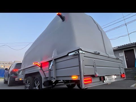 Усиленный двухосный прицеп ЛАВ 81013Е с зауженной колеей окрашенный в серебро раптором